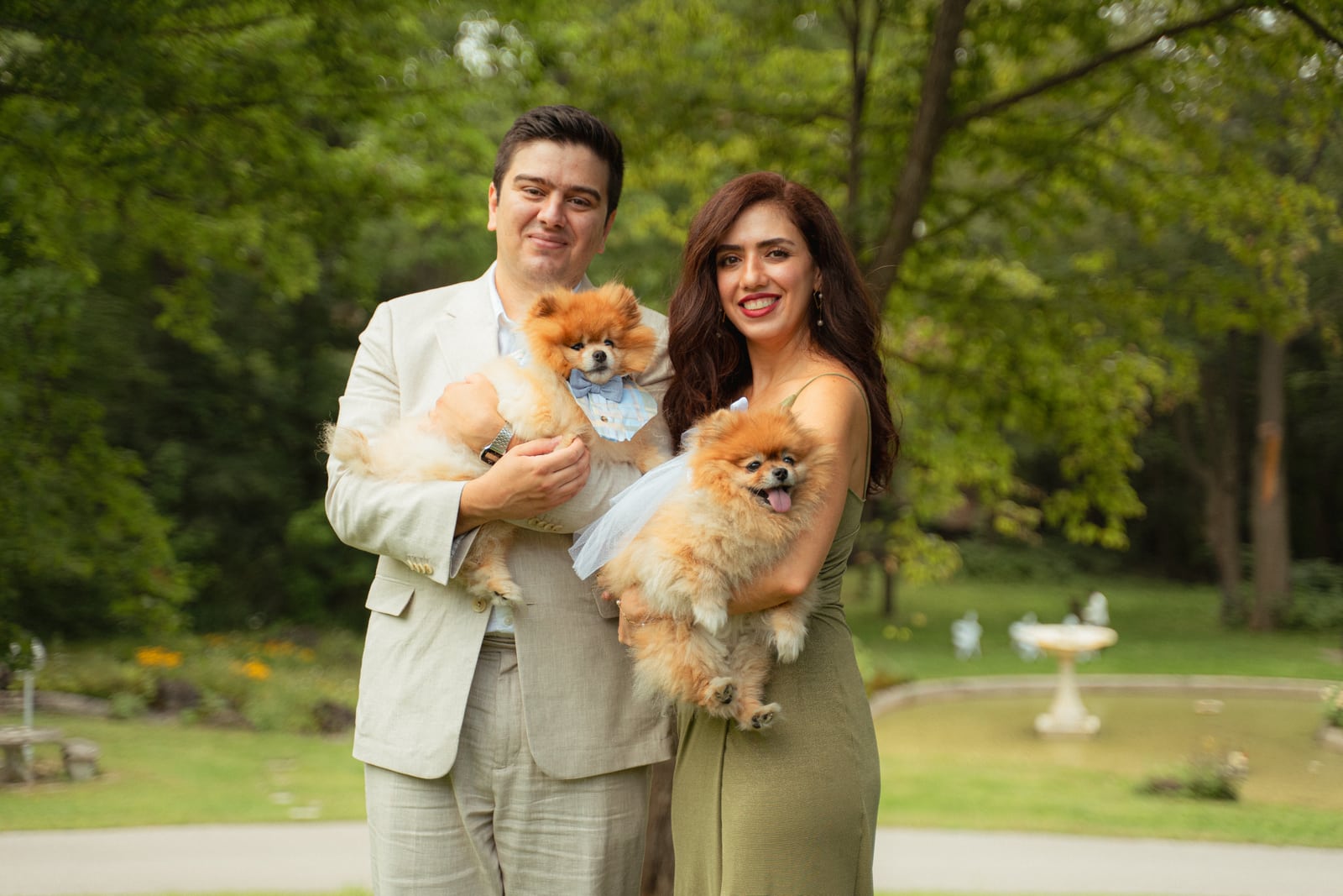Hanif Hosseini and his wife Ellie with their dogs, Joey and Maya